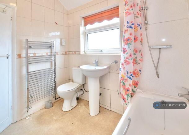 Modern Bathroom With Shower And Heated Towel Rail