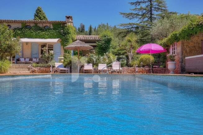 Private pool surrounded by greenery in a prestigio