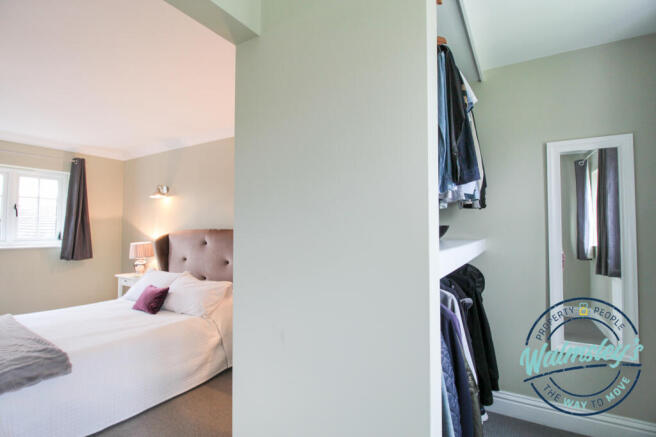 Dressing room to main bedroom