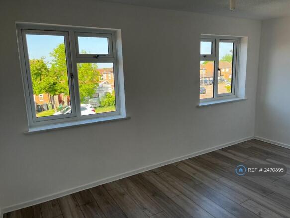 Front Bedroom With Two Windows