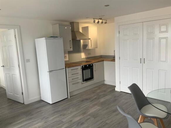 Bright modern kitchenette with dining area...
