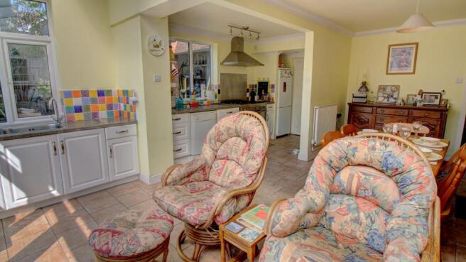Sitting Area toward Kitchen & Dining