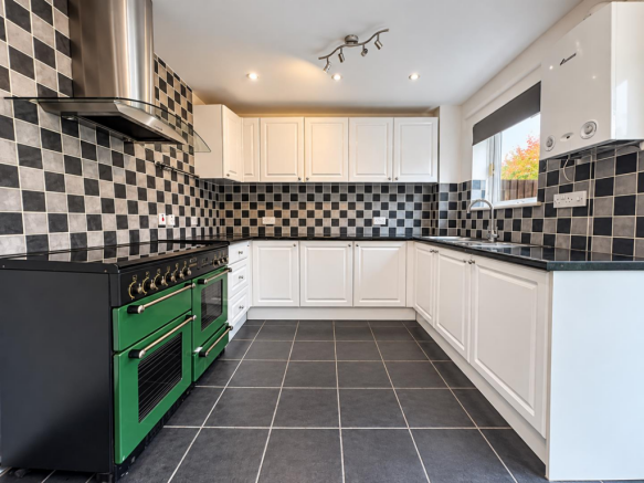 Emerald Range in a Modern Tiled Kitchen.png