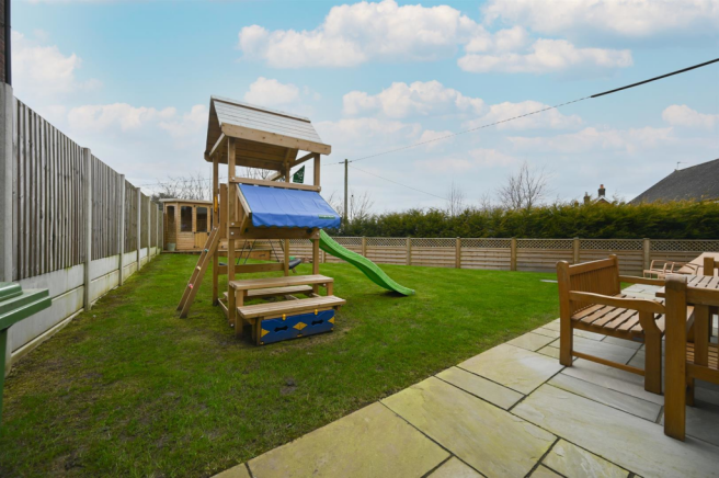 Patio and gardens to rear