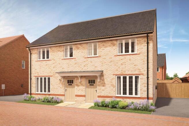 A pair of modern semi-detached houses with light brickwork and light-colored doors stand in the fore