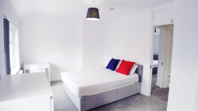 Bright, freshly decorated double bedroom with n...