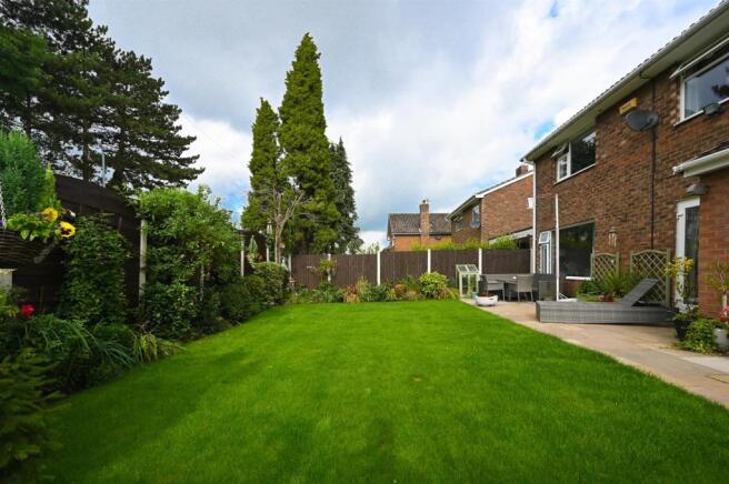 Patio and gardens to rear
