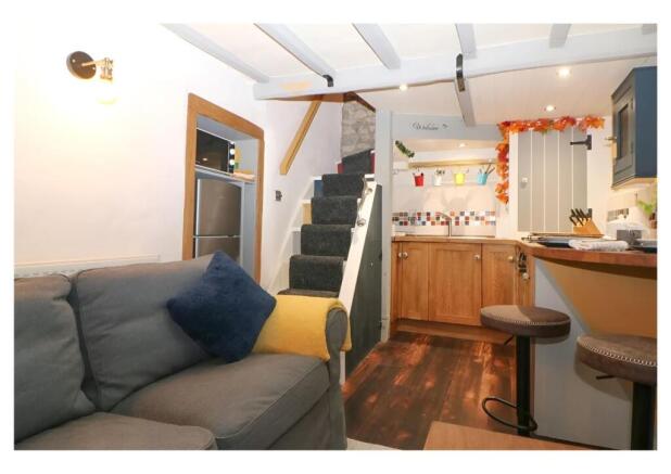 Bottom of stairs and sink.jpg