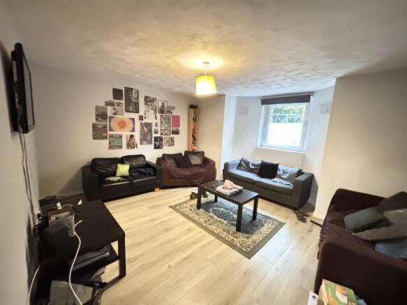 A well-lit and spacious contemporary living roo...