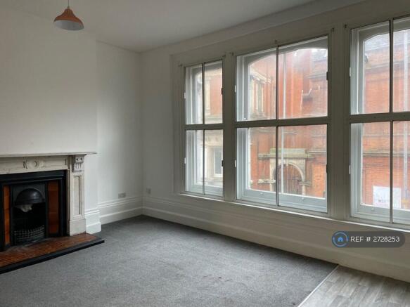 High Ceilings & Large Windows