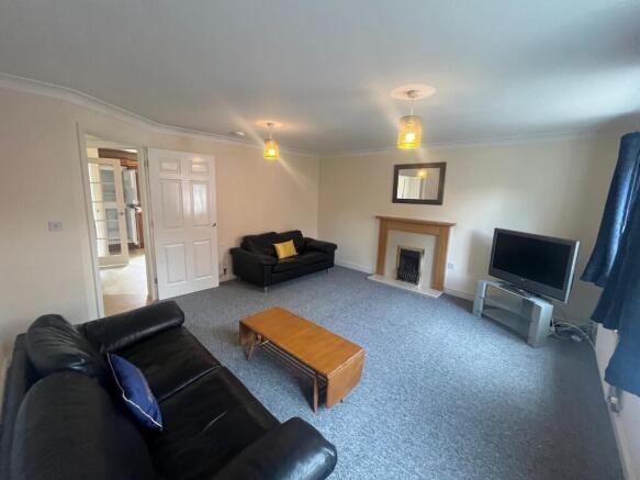 Bright, well-presented living room with neutral...