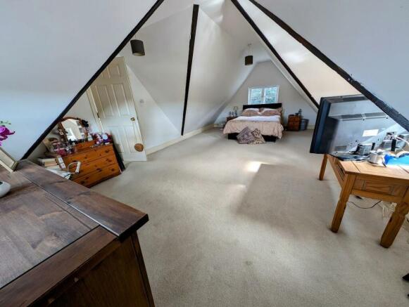master suite bed lounge.jpg