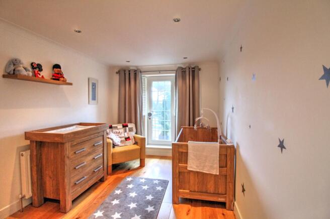 Bedroom Four and balcony