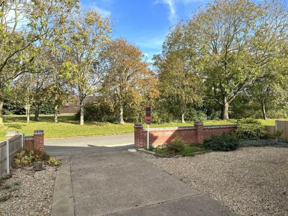 Generous Driveway & Delightful Tree-Lined Outlook 