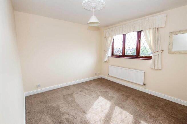 BEDROOM ONE (FRONT)