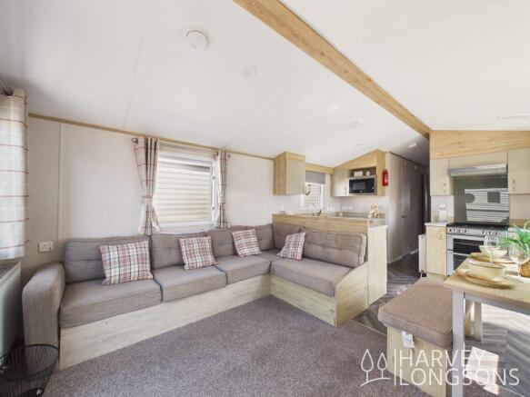 Open-plan lounge and kitchen in the Atlas Eden