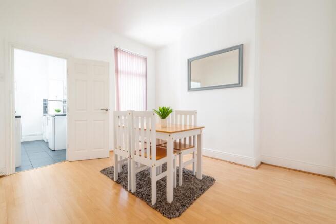 Bright and welcoming living room featuring natu...