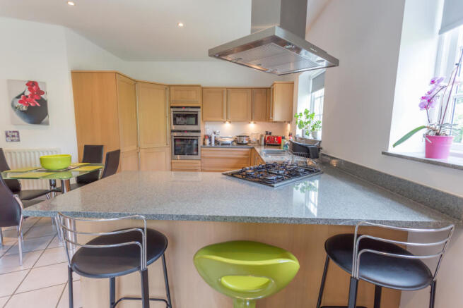 Kitchen area with granite tops
