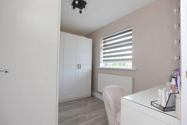 Bedroom three/dressing room