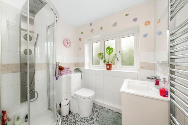 BEDROOM ONE EN-SUITE SHOWER ROOM