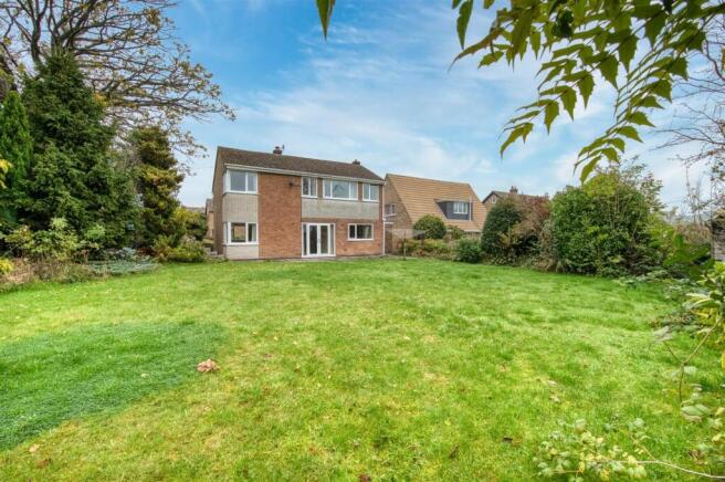 Rear Garden - lawn and rear of the home.jpg