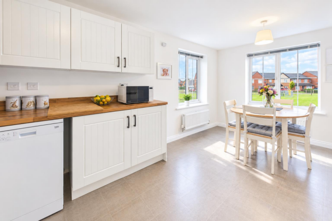 Bright Minimalist Kitchen and Dining Nook.png