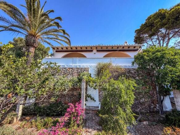 House surrounded by countryside in Cala Santandria