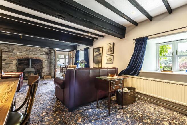 Living room, original ceiling beams & wood burner