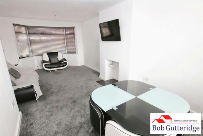 THROUGH LOUNGE / DINING ROOM