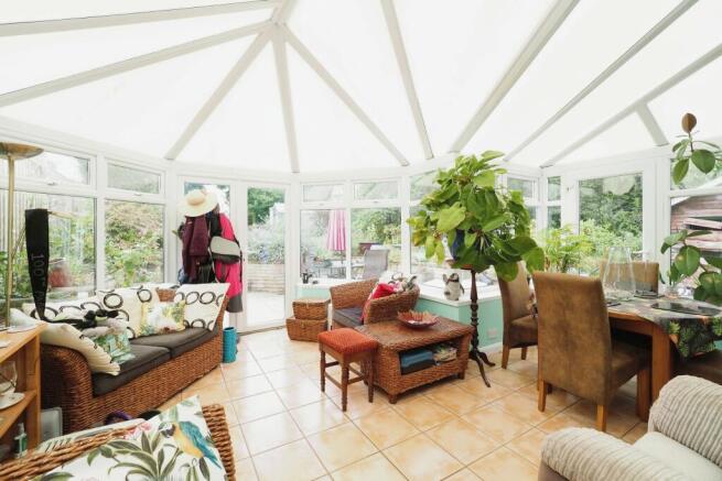 Very Generous conservatory offering further potential