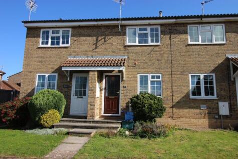 A Two Bedroom Mid Terraced House With Car Parking, Garage And Garden.