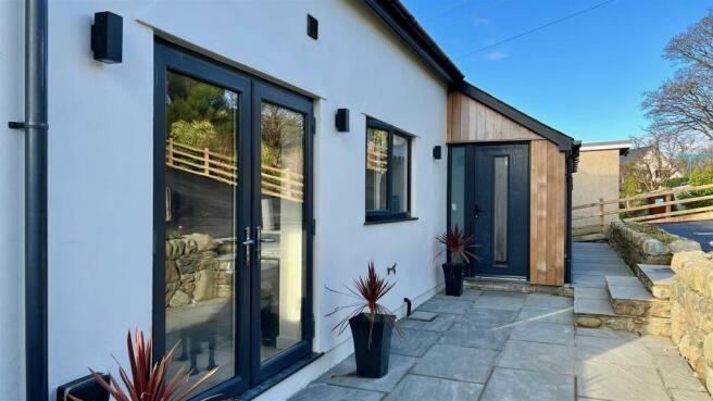 Front door & Patio doors to kitchen