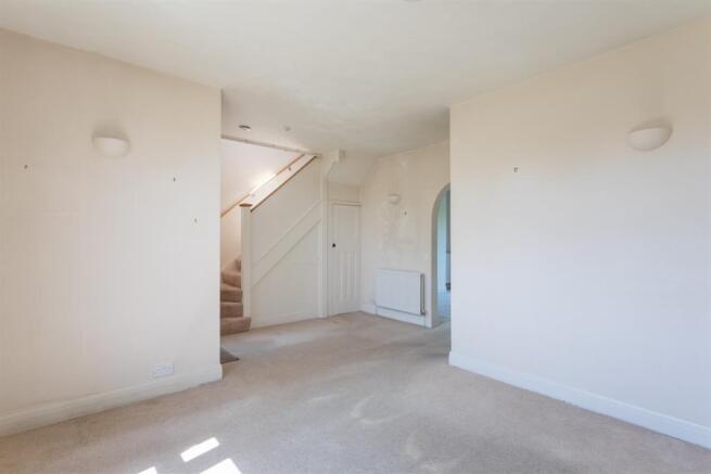 Sitting Room Open To Hallway
