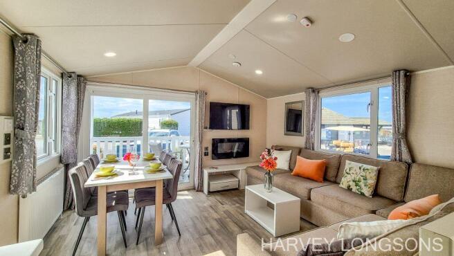 Bright open-plan lounge and dining area inside the