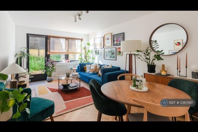 Living Room, Opens Onto Private Decked Terrace
