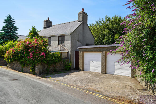 Double Garage + Driveway