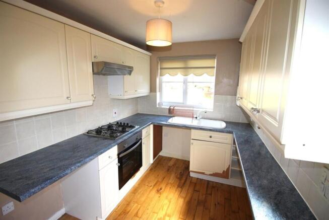Bright kitchen with ample counter space...
