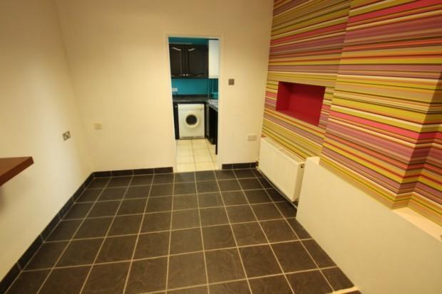 office leading to kitchen