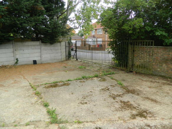secure yard with access to rear of garage