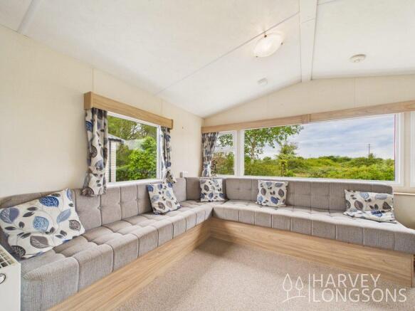 L-shaped Sofa in the Delta Radiant Holiday Caravan