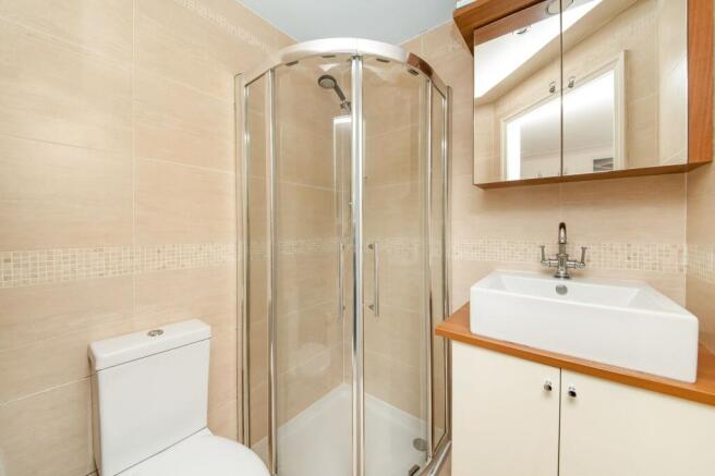 BEDROOM ONE EN-SUITE SHOWER ROOM