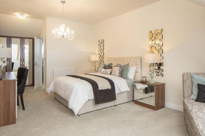 En suite main bedroom in the Woodcote 4 bedroom home