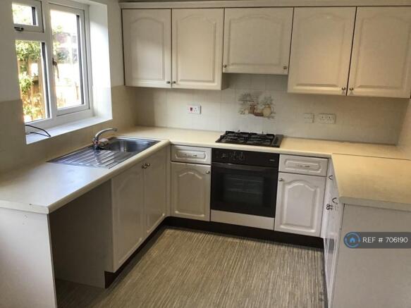 Kitchen, Blinds Are Being Fitted