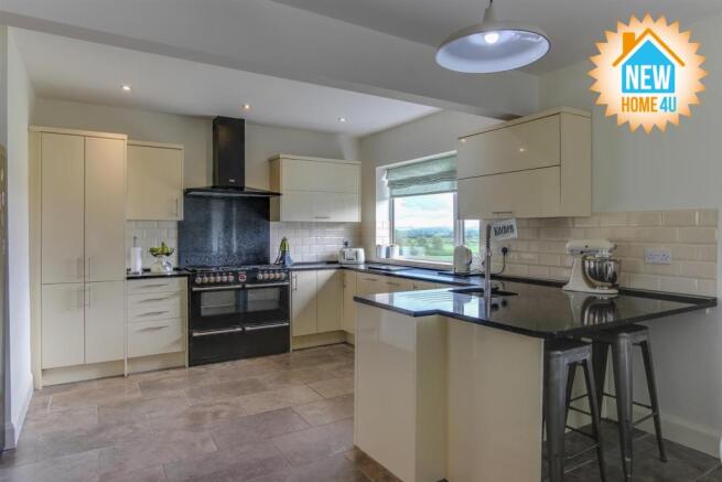 KITCHEN/DINING AREA/ FAMILY ROOM: