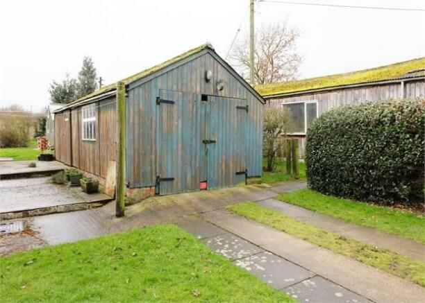 Detached wooden garage workshop 