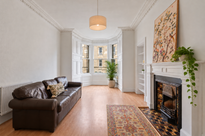 Elegant Victorian Living Room with Greenery