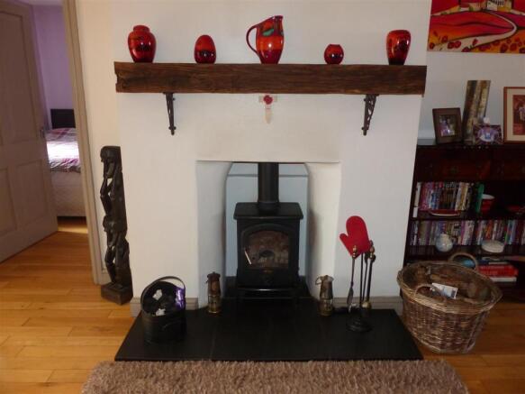 LOG BURNER IN LOUNGE.JPG