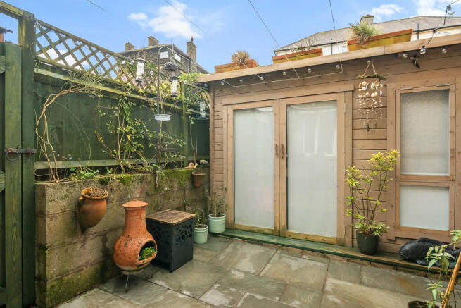 Rear patio and st...