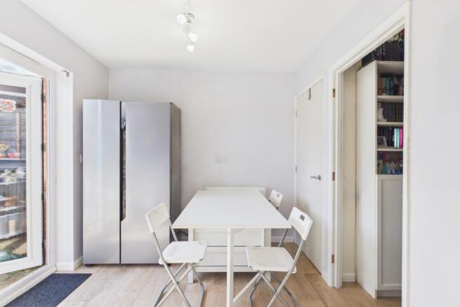 Imagine family dinners at the table and patio door