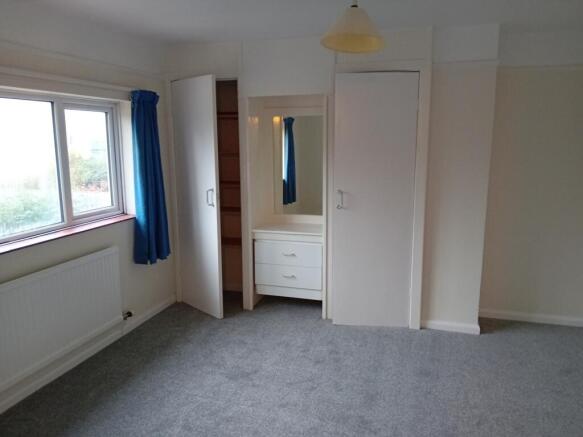 Bed 1 and wardrobes